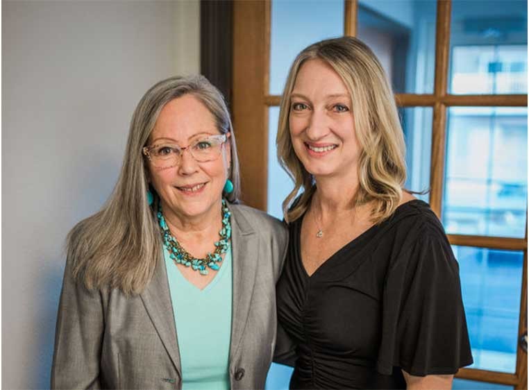 The owner and previous owner, Cindy and Gretchen.